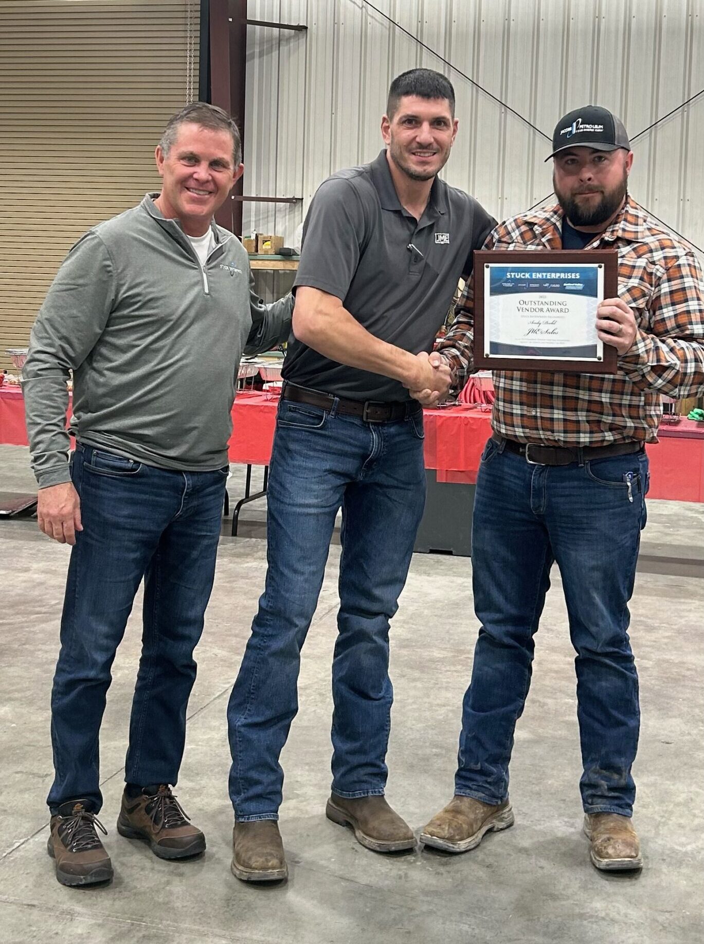 Steve Stuck presents Andy Diehl with Stuck Enterprises' Vendor of the Year Award for 2023